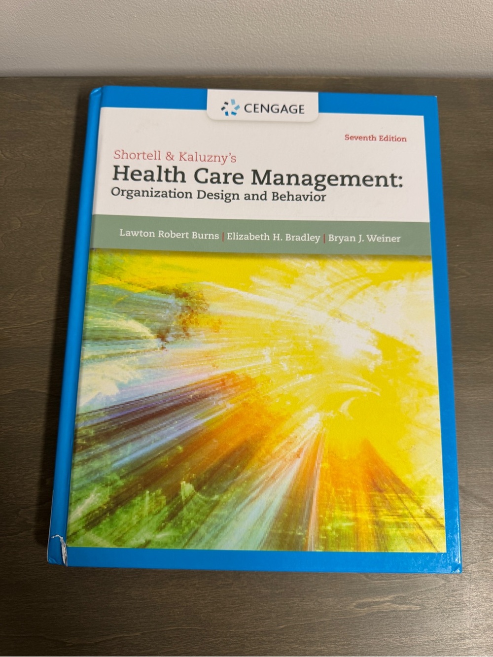 Health Care Management Hardcover Textbook in Blue and Yellow